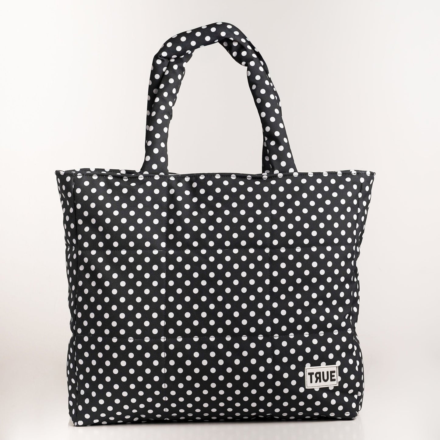 Puffer Ana lunares negro con blanco