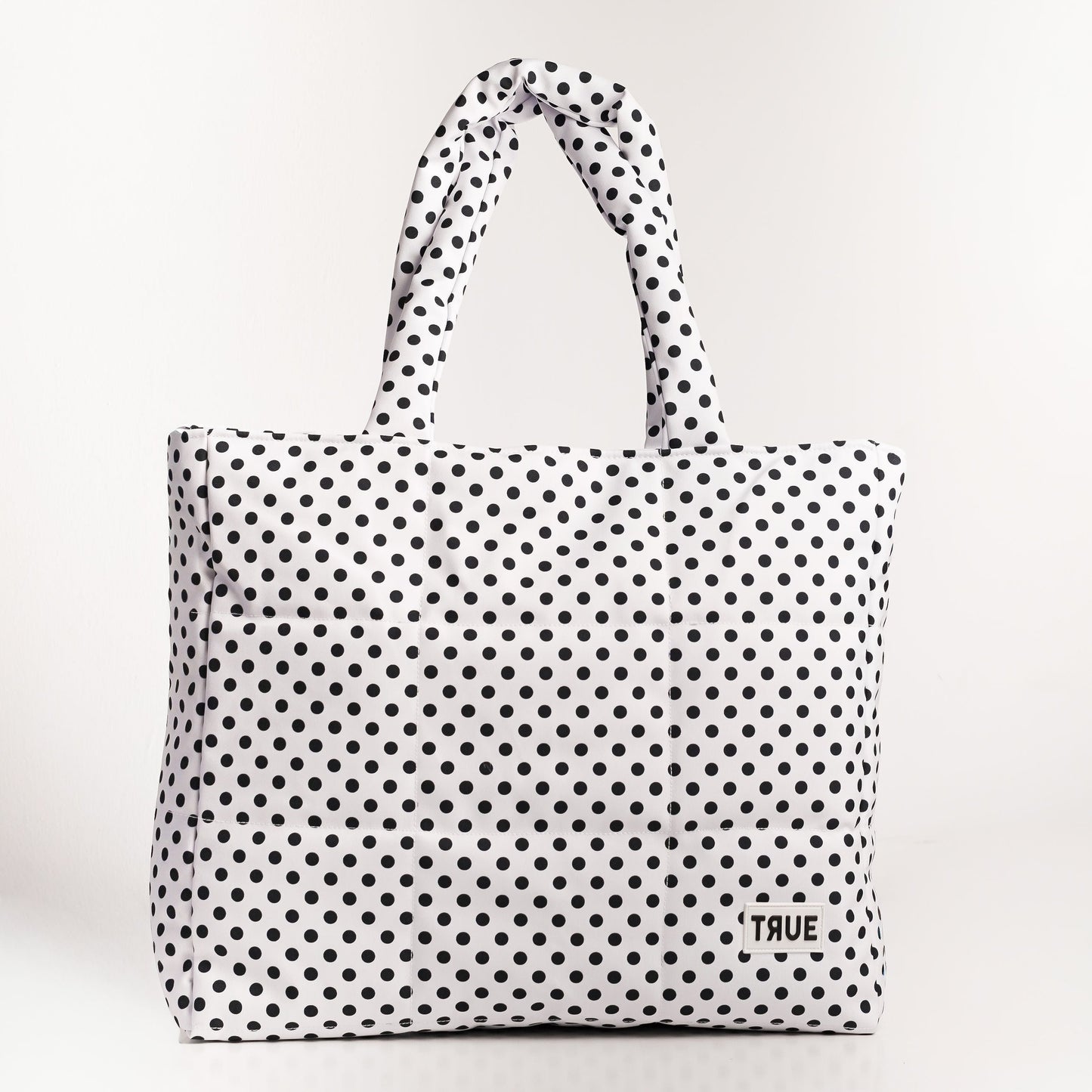Puffer Ana lunares blanco con negro